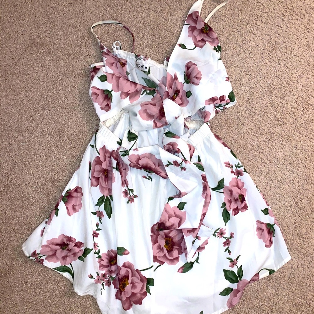 Super cute romper that ties in front.